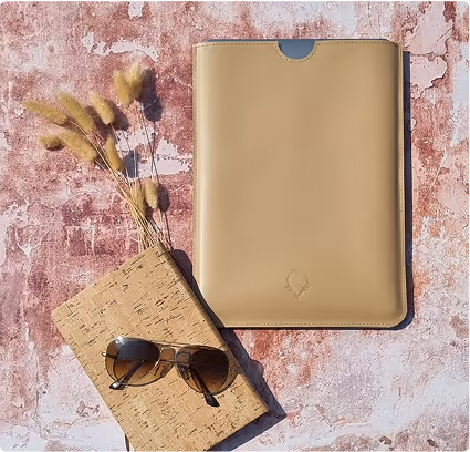 A pair of sunglasses and a case sitting on a table.