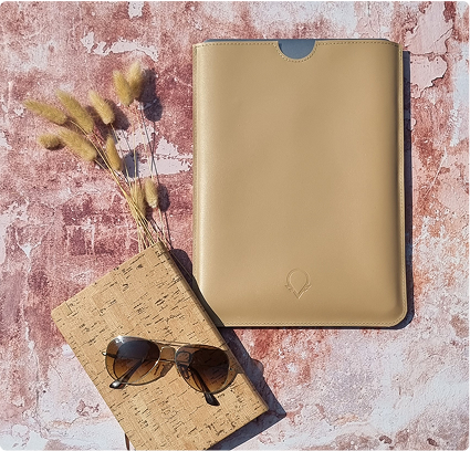 A pair of sunglasses and a case sitting on a table.