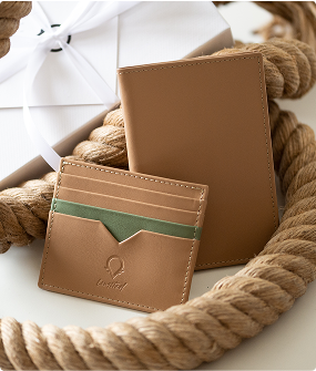 A rope with a wallet and a card case on it.