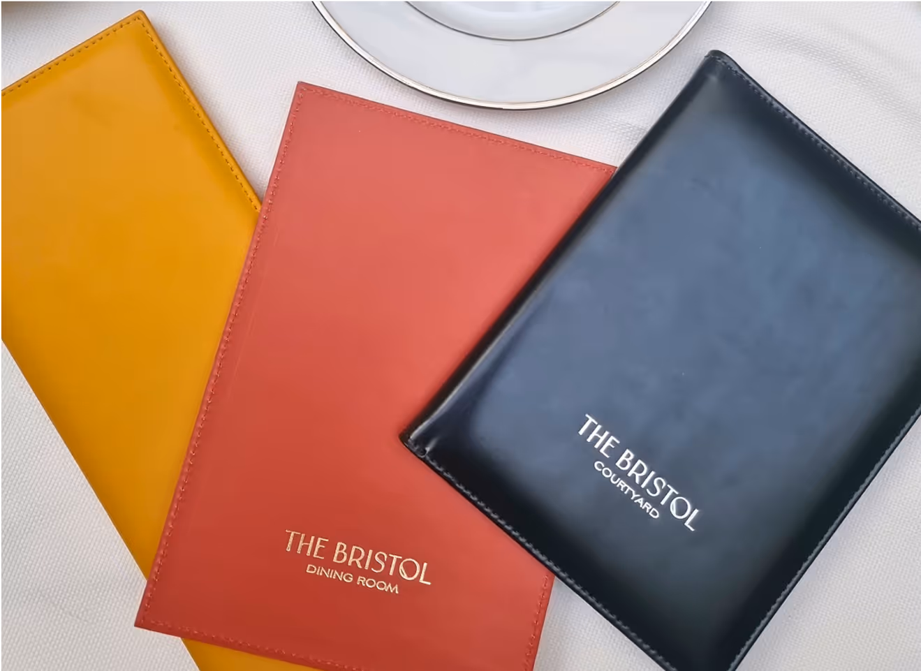 A couple of books that are on a table.