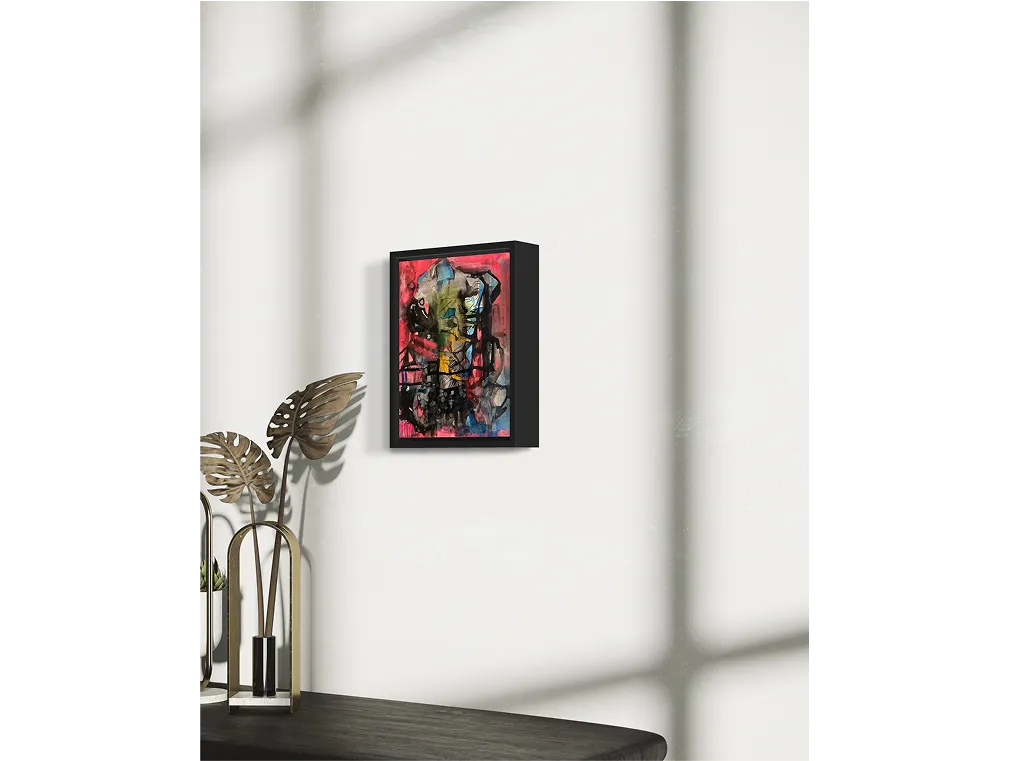 Abstract artwork "Brain" on white wall, next to a plant with metallic leaves and soft sunlight shadows.
