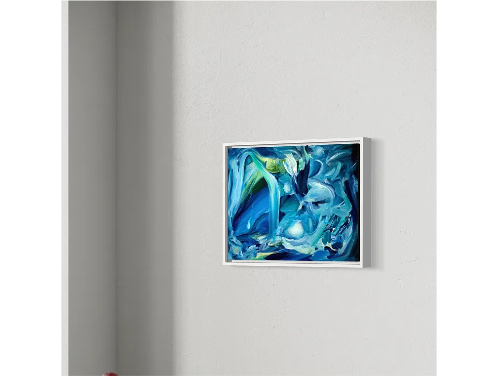 A framed "Blue Matter" painting hangs on a light gray wall in a minimalist corner with soft natural lighting.