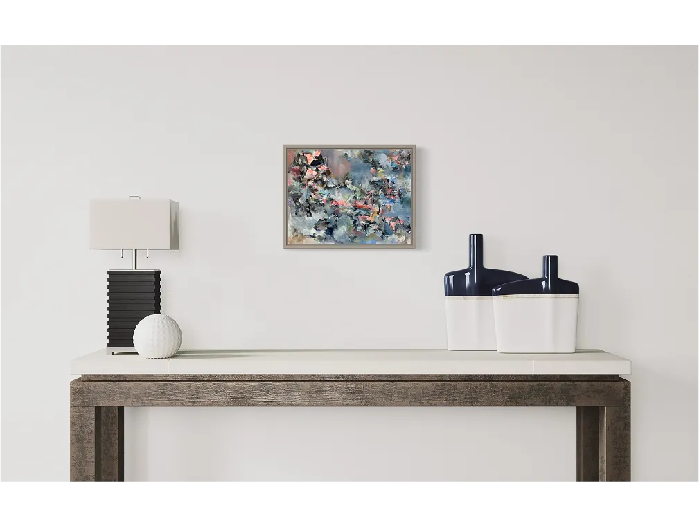 "Dizzy in Becoming" — expressive abstraction in soft hues of dusk blue, coral, and charcoal, shown in a modern home interior.