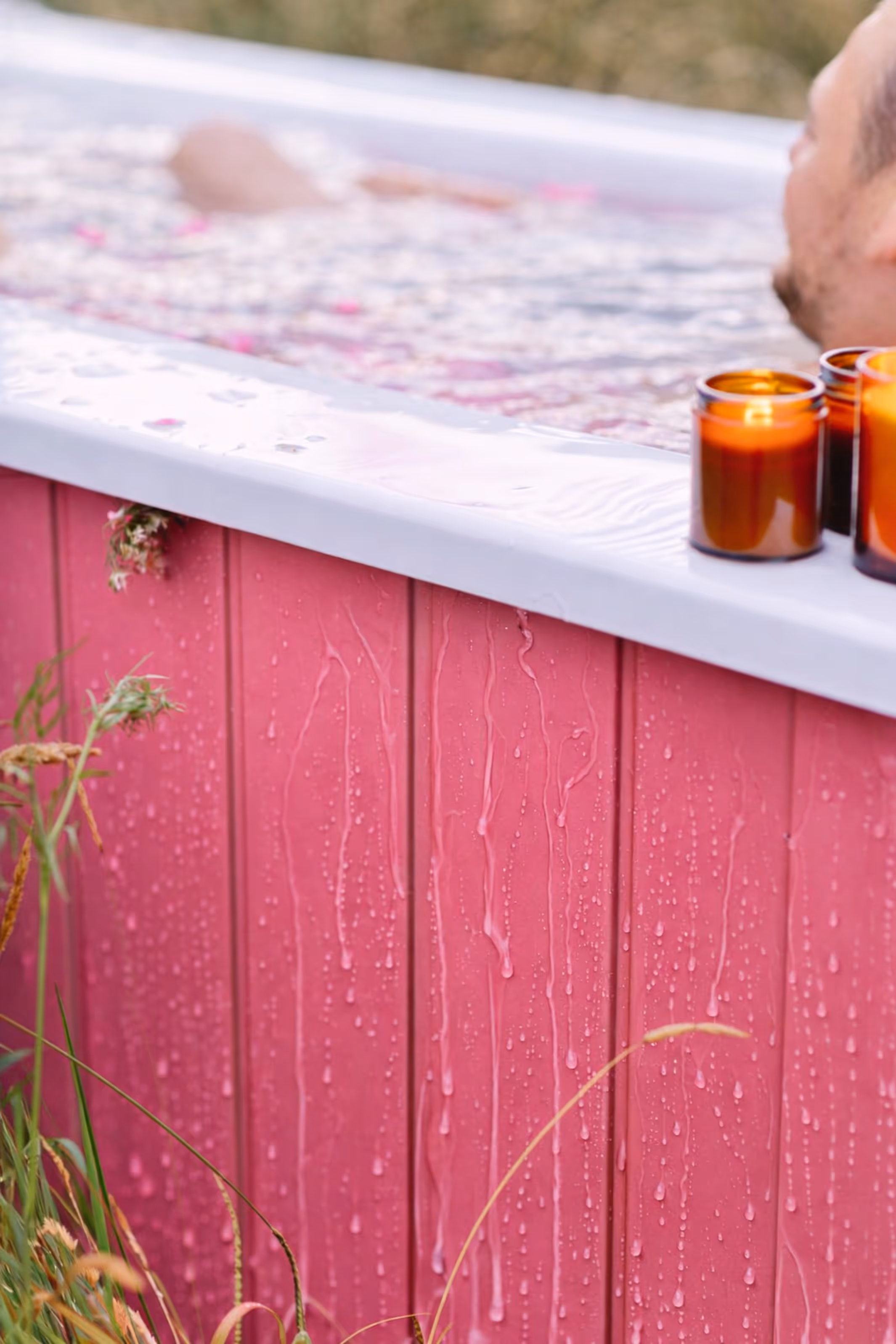Star Bath in a custom pink architectural painted finish with flower petals and candlelight