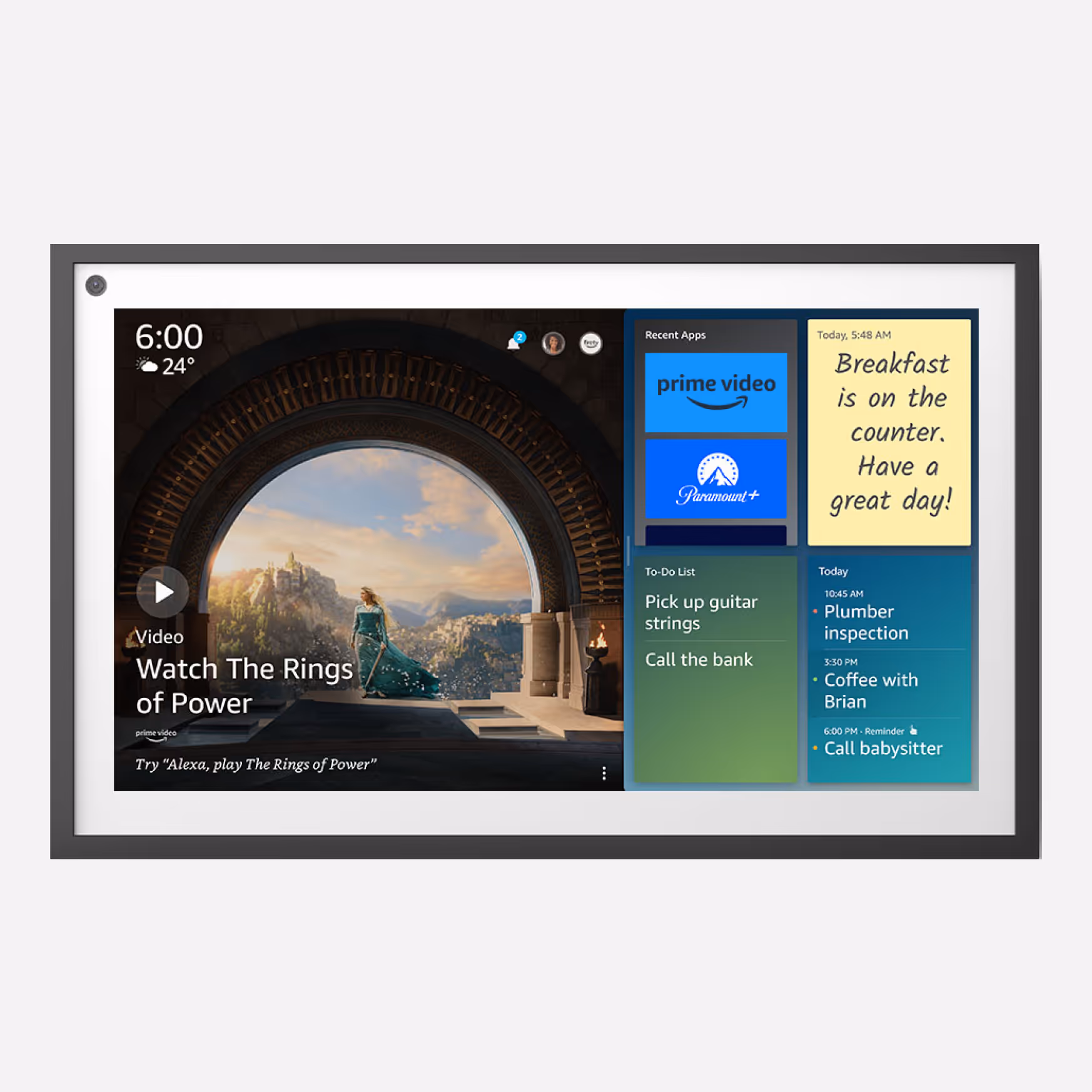 Wall-mounted Alexa Echo Show 15 smart display, showing a digital interface with widgets and touch controls, used for voice and home automation.
