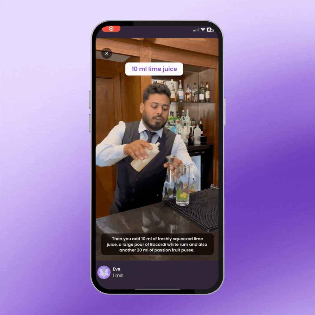 A gif of a phone which is playing a reel of a barman showing the steps to  create a cocktail.