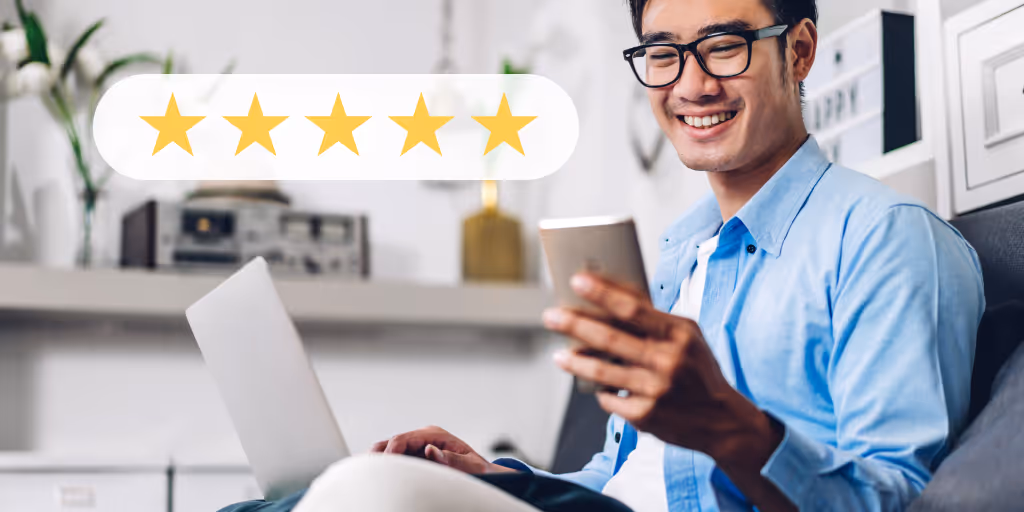 A 5 star customer service satisfaction rating with a man smiling at his mobile phone in the background