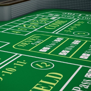 a green felt craps table close up
