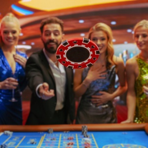 An image of a poker chip flying through the air flicked by the player at the games table in a casino