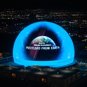 An image of the Sphere is Las Vegas with the Postcard From Earth image on the outside