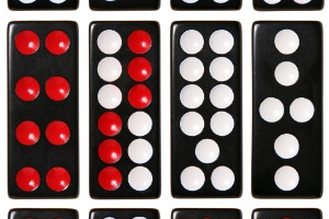 An image of the layout of Pai Gow black, red and white dominos on a white background