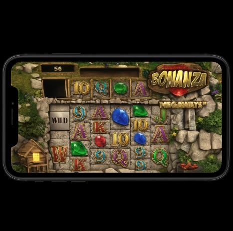 An image of a silver mobile on a black background, on the screen is an online slot game similar to Bonanza Megaways