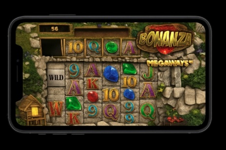 An image of a black background with a silver mobile in the centre, on the screen is an online slot game similar to Bonanza Megaways