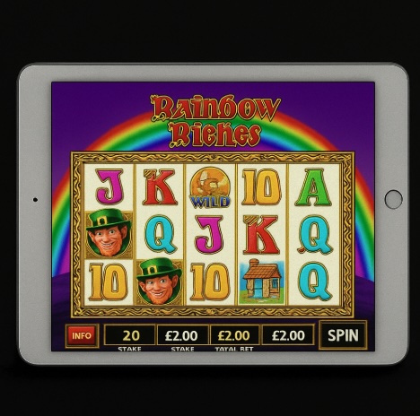 An online screen image on an ipad similar to the Rainbow Riches theme game