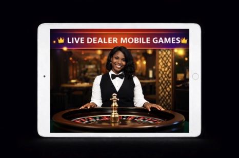 An image of a silver ipad on a black background, on the screen there is a female croupier in a casino setting behind a roulette wheel with text saying LIVE DEALER MOBILE GAMES