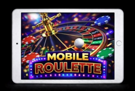 An image of a silver ipad on a black background, on the screen is a MOBILE ROULETTE image