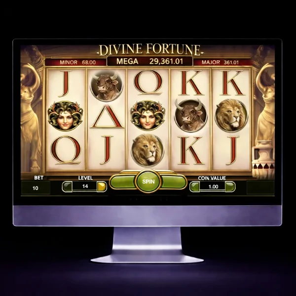 An image of a silver mac monitor on a black background with a DIVINE FORTUNE themed online slot game image on the screen