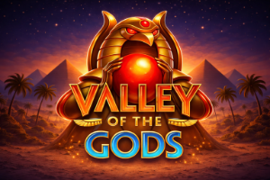 An image of a giant scarab style glden creature holding a big red ball, the background is dark blue/purple and brown egyptian looking with pyramids and bold red, gold and blue text saying VALLEY OF THE GODS