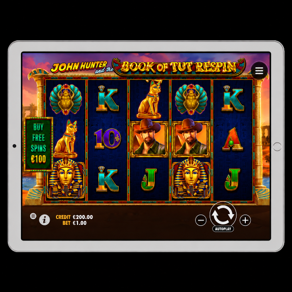 An image of a silver ipad on a black background, on the screen is an image of JOHN HUNTER AND THE BOOK OF TUT RESPIN online slot game