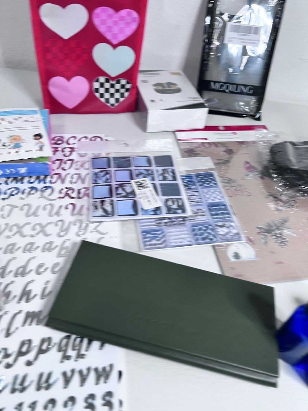 Mixed Lot of Gadgets, Accessories & Fun Items – Black Mask, Earphones, Stickers