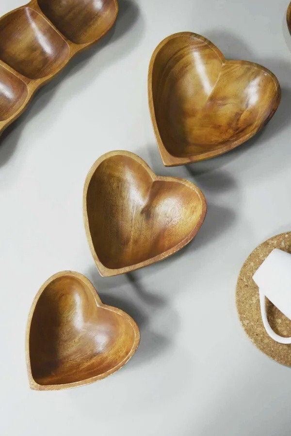 Set of three wild olive wood nesting heart bowls This lovely set of heart-shaped