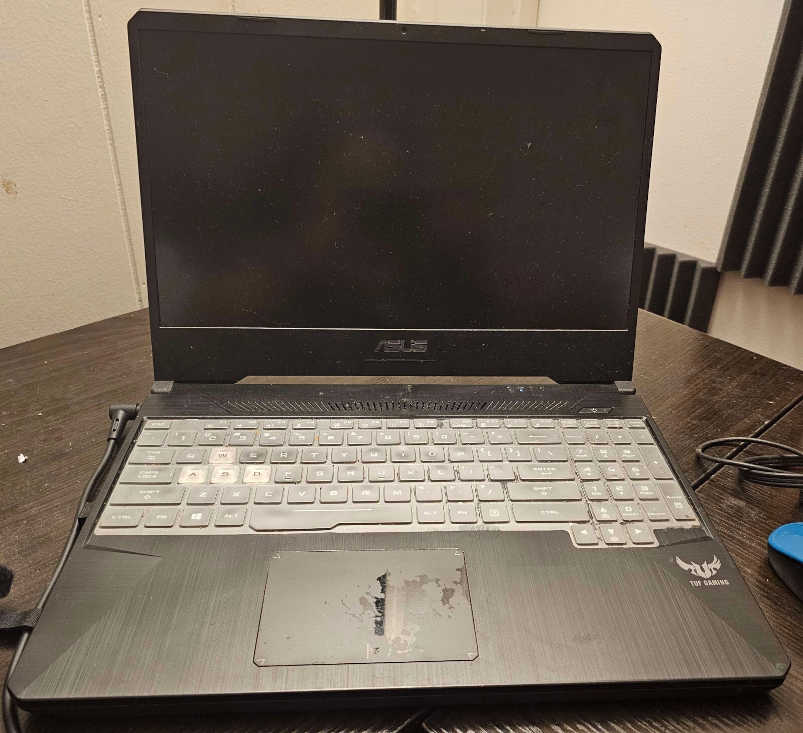 ASUS TUF Gaming Laptop with additional accessories