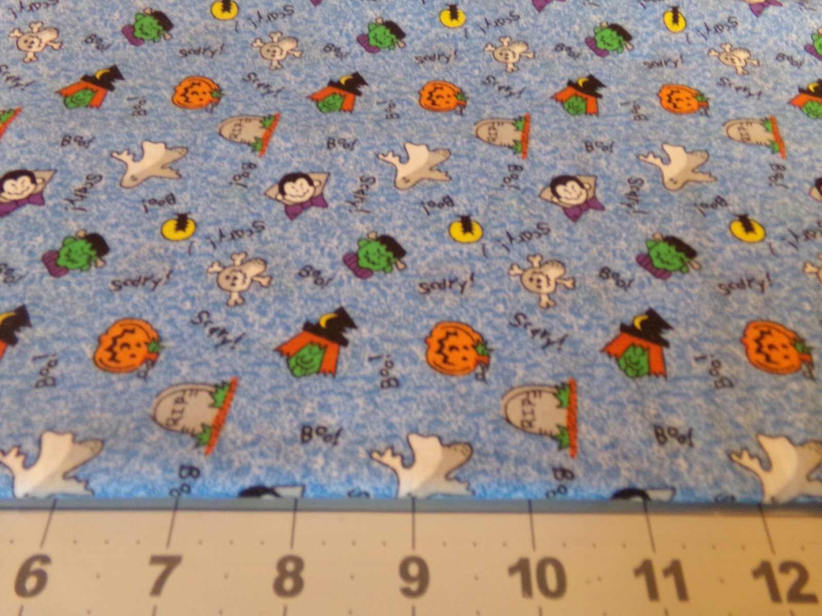 1 YD" X 44" VINTAGE ASSORTMENT SMALL HALLOWEEN ITEMS & SAYINGS /BLUE NEW COTTON