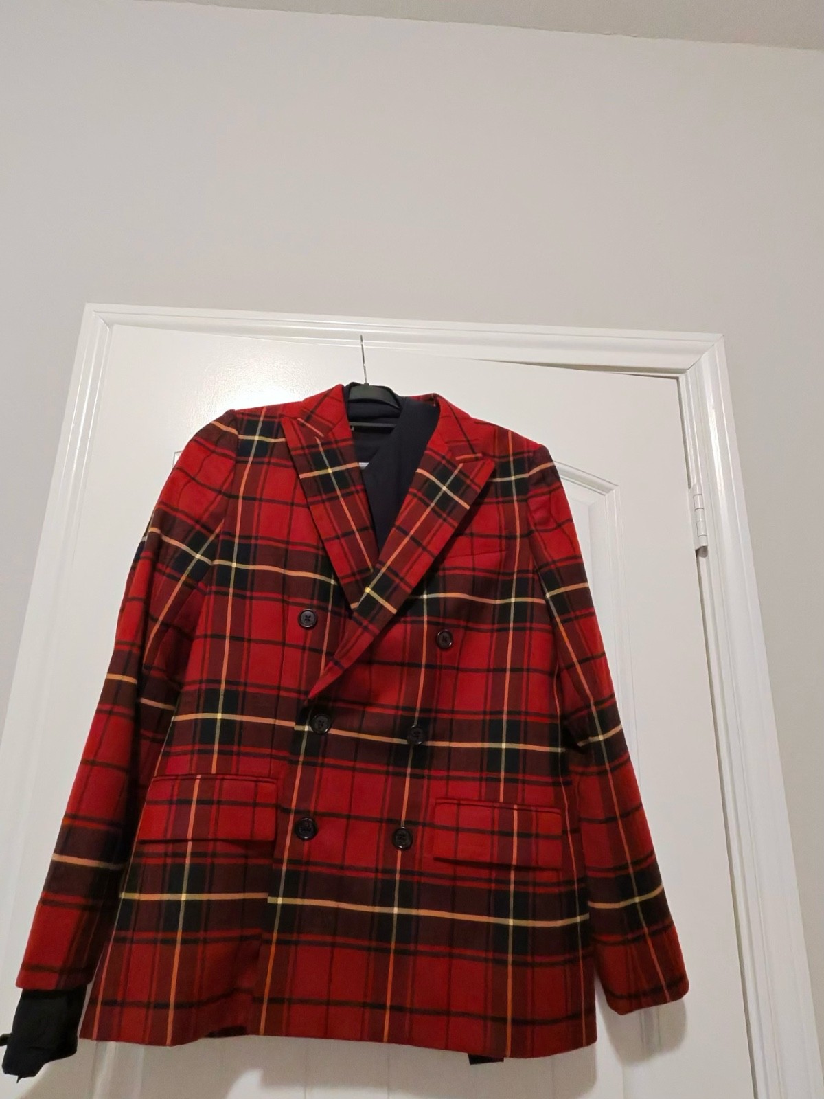 Red Tartan Double-Breasted Blazer — bold Royal Stewart-style plaid, dark buttons