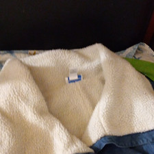 The Coat Is From Denim Moves.
