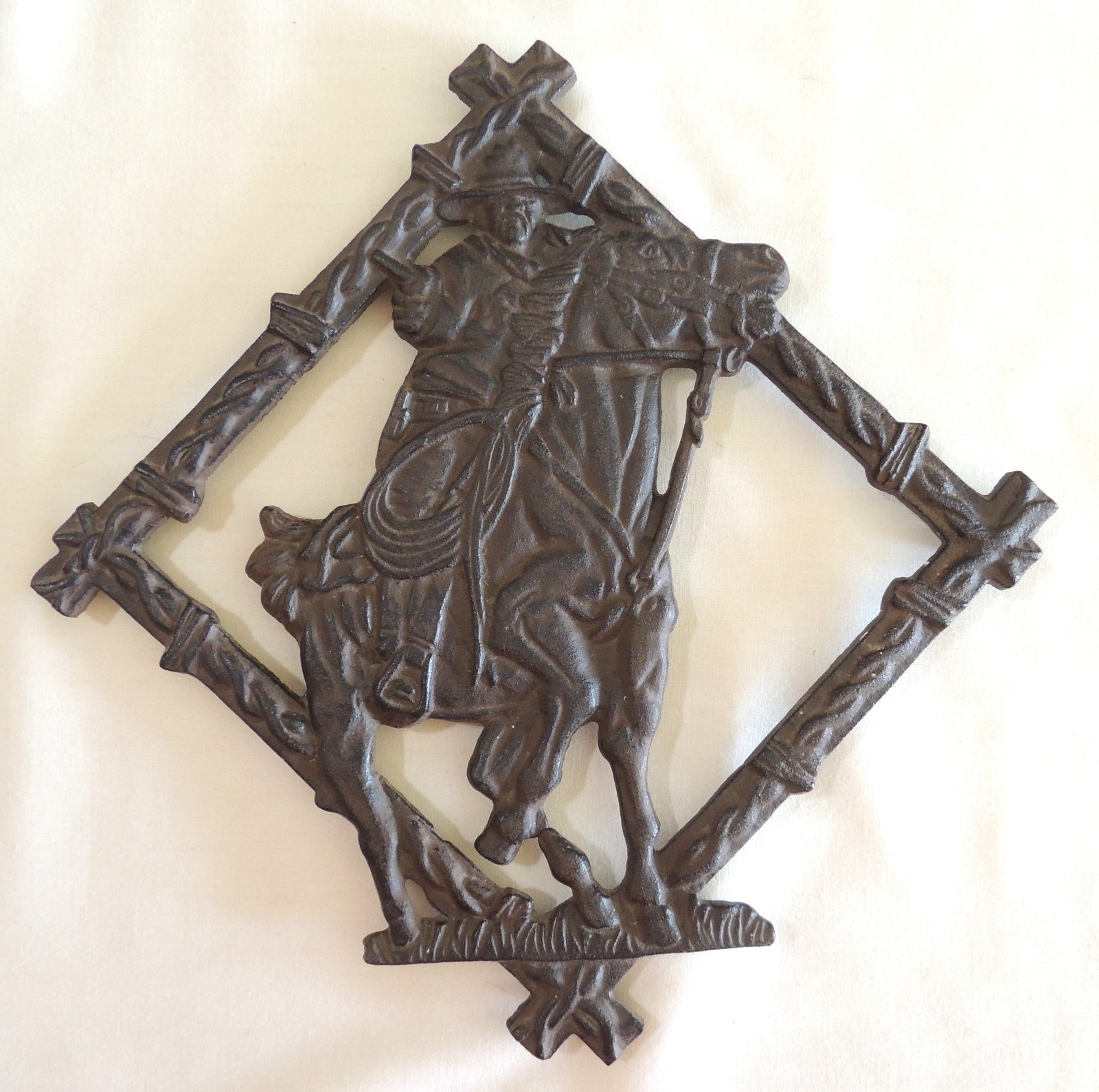 Cast Iron Trivet Wall Art Western Cowboy with a Horse, about 12" across