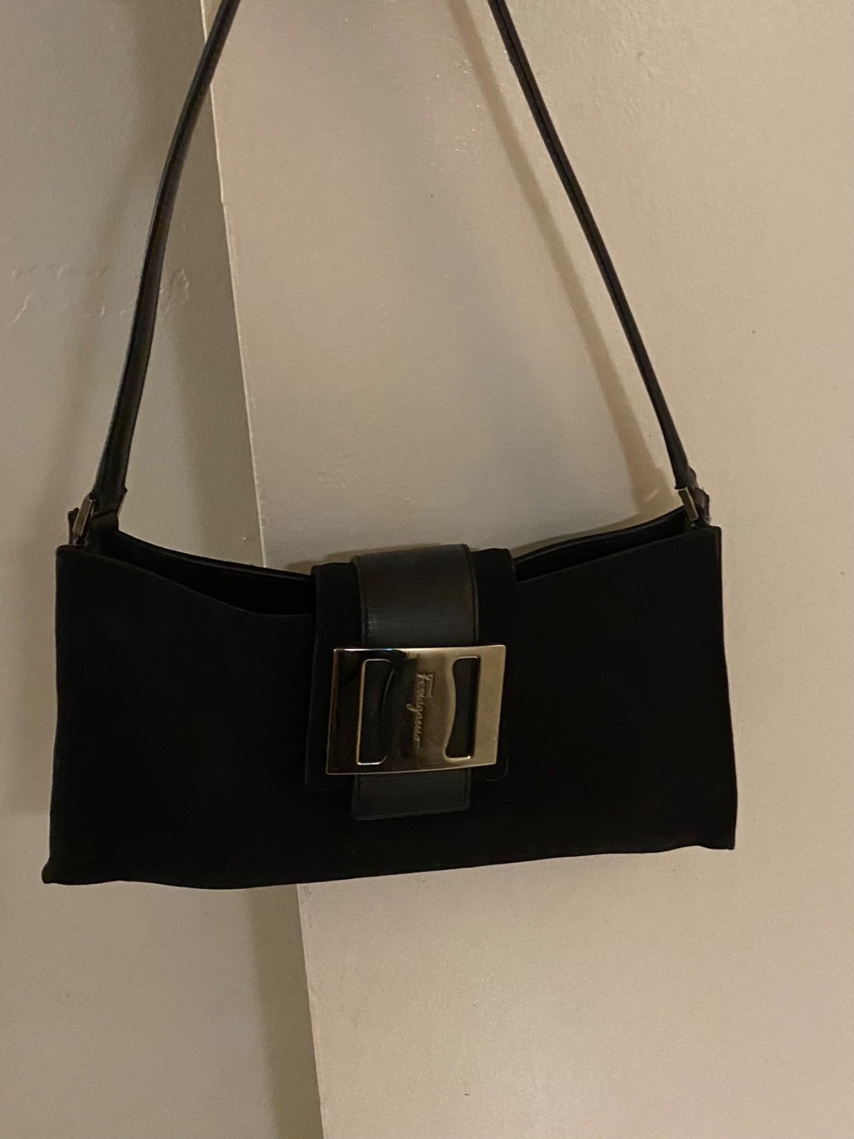 Authentic Ferragamo shoulder bag black leather strap with silver Ferragamo front