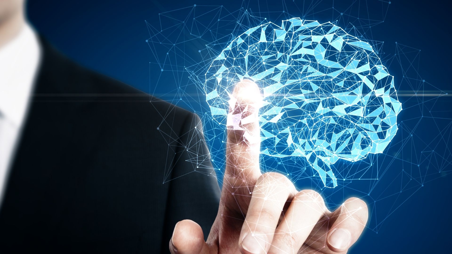 Blue background with image of a finger poking a brain that is lit up electric blue