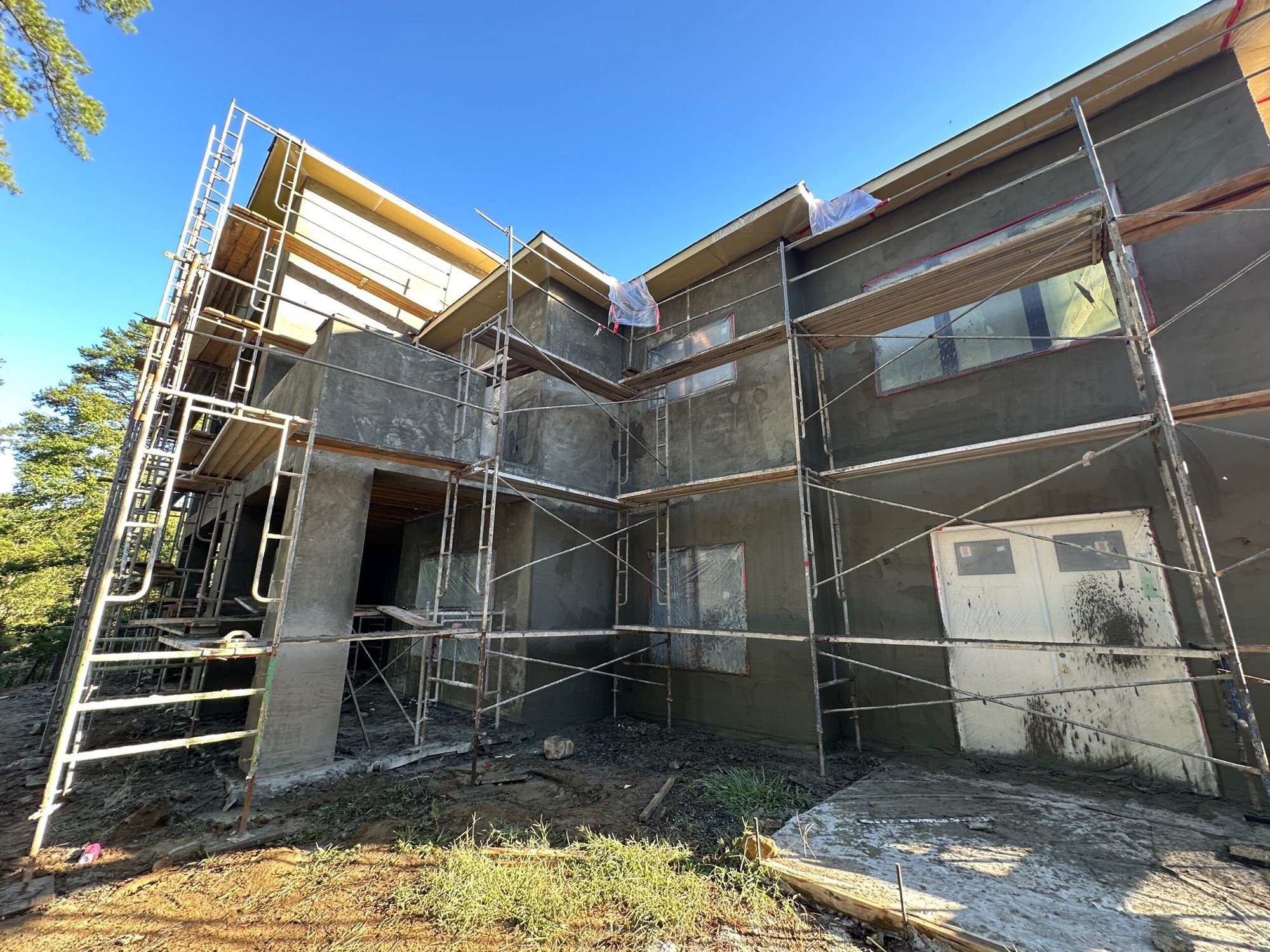 Stucco, layer by layer, in McLean