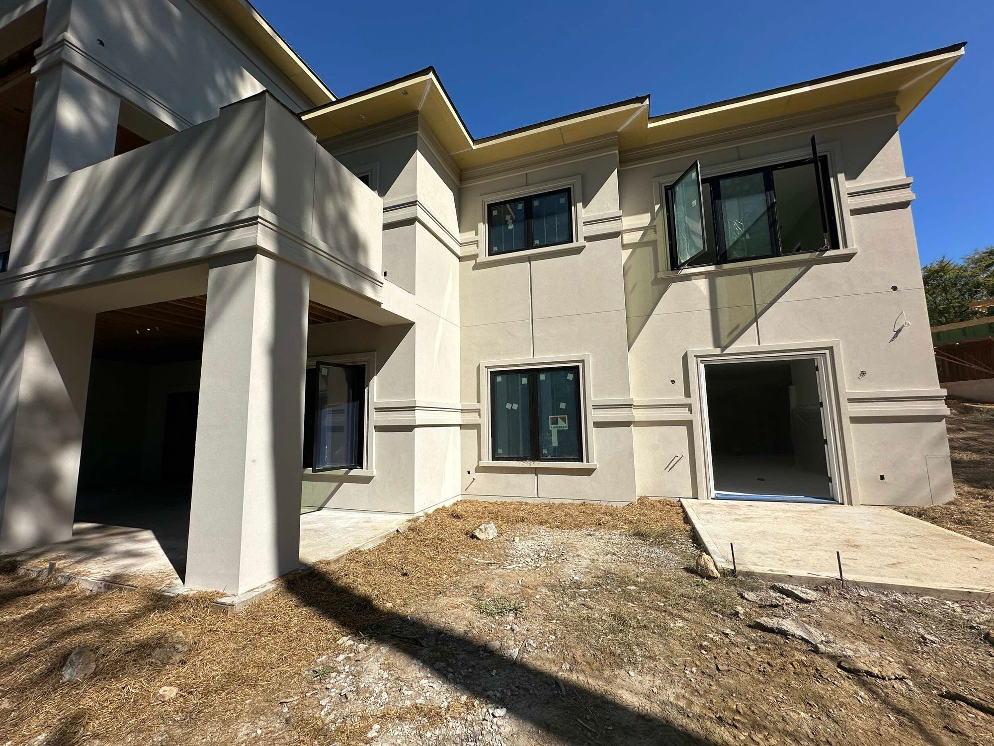 Scaffolding comes down on a stucco home in McLean