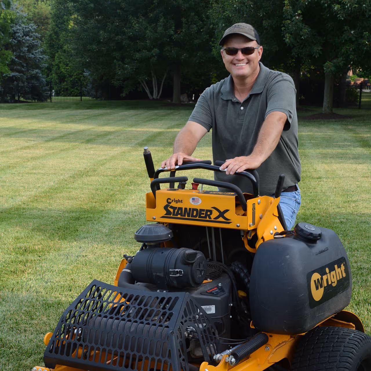 Lush green Kansas lawn after comprehensive turf fertilization program