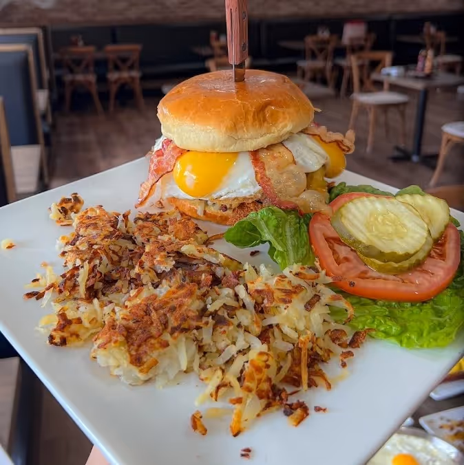 Bacon and egg burger with hashbrowns