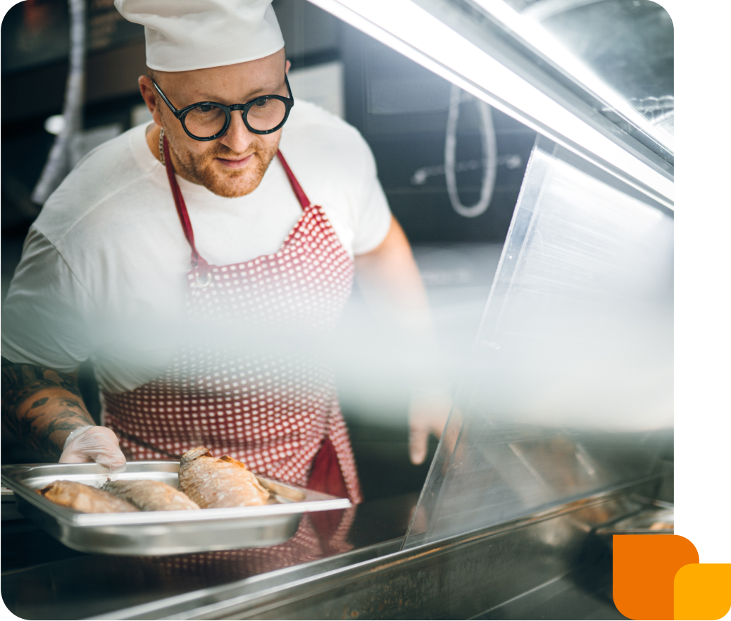 Overhead shot of a chef working at a grill
