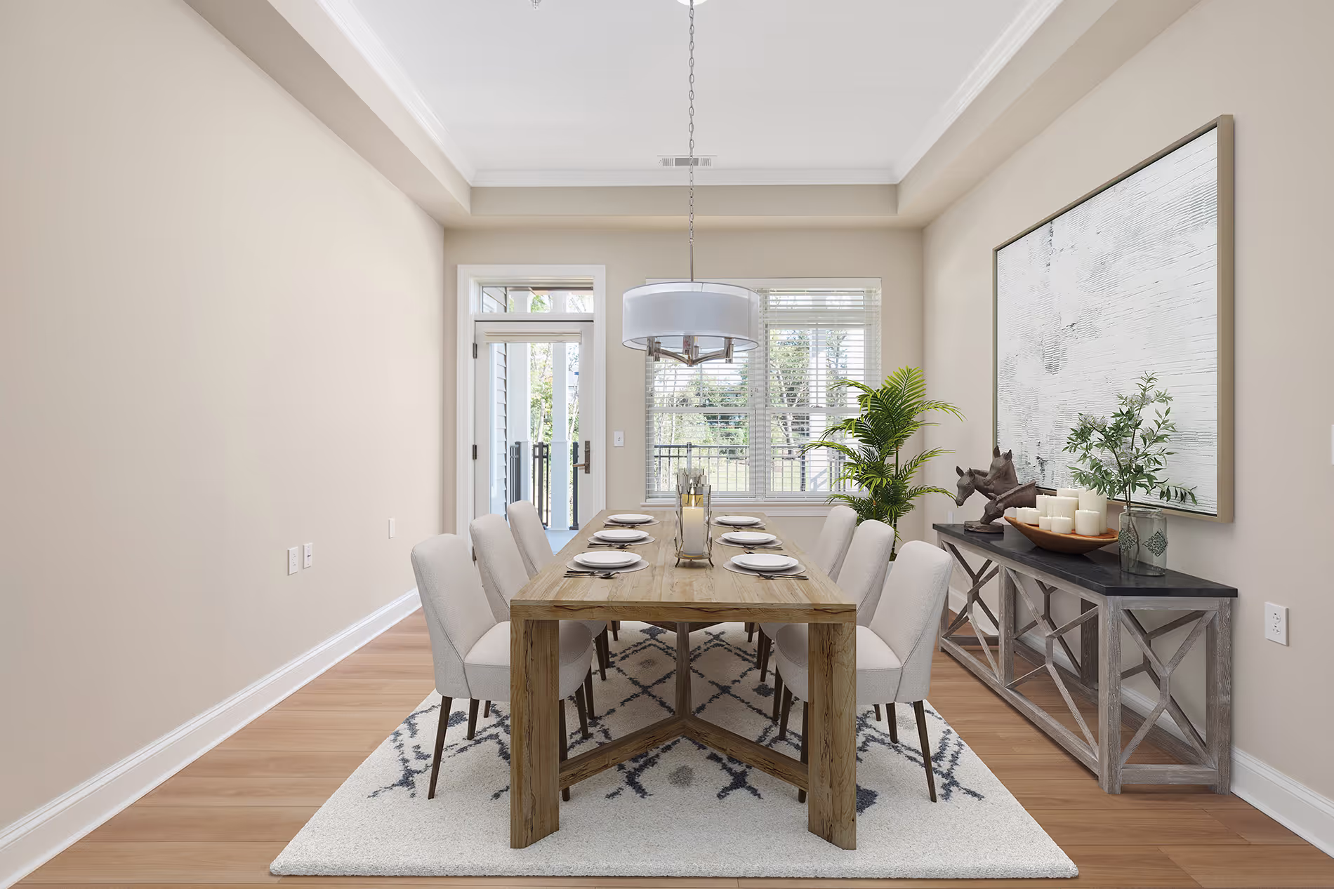 A dining room with a wooden table, six chairs, and a decorative sideboard against the wall.