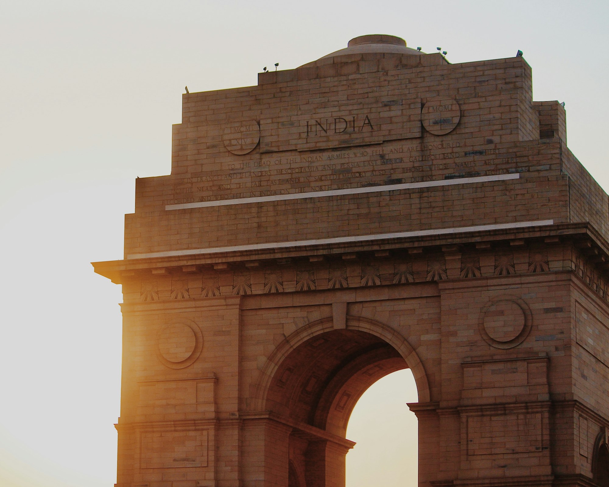 India Gate in New Delhi under a blue sky