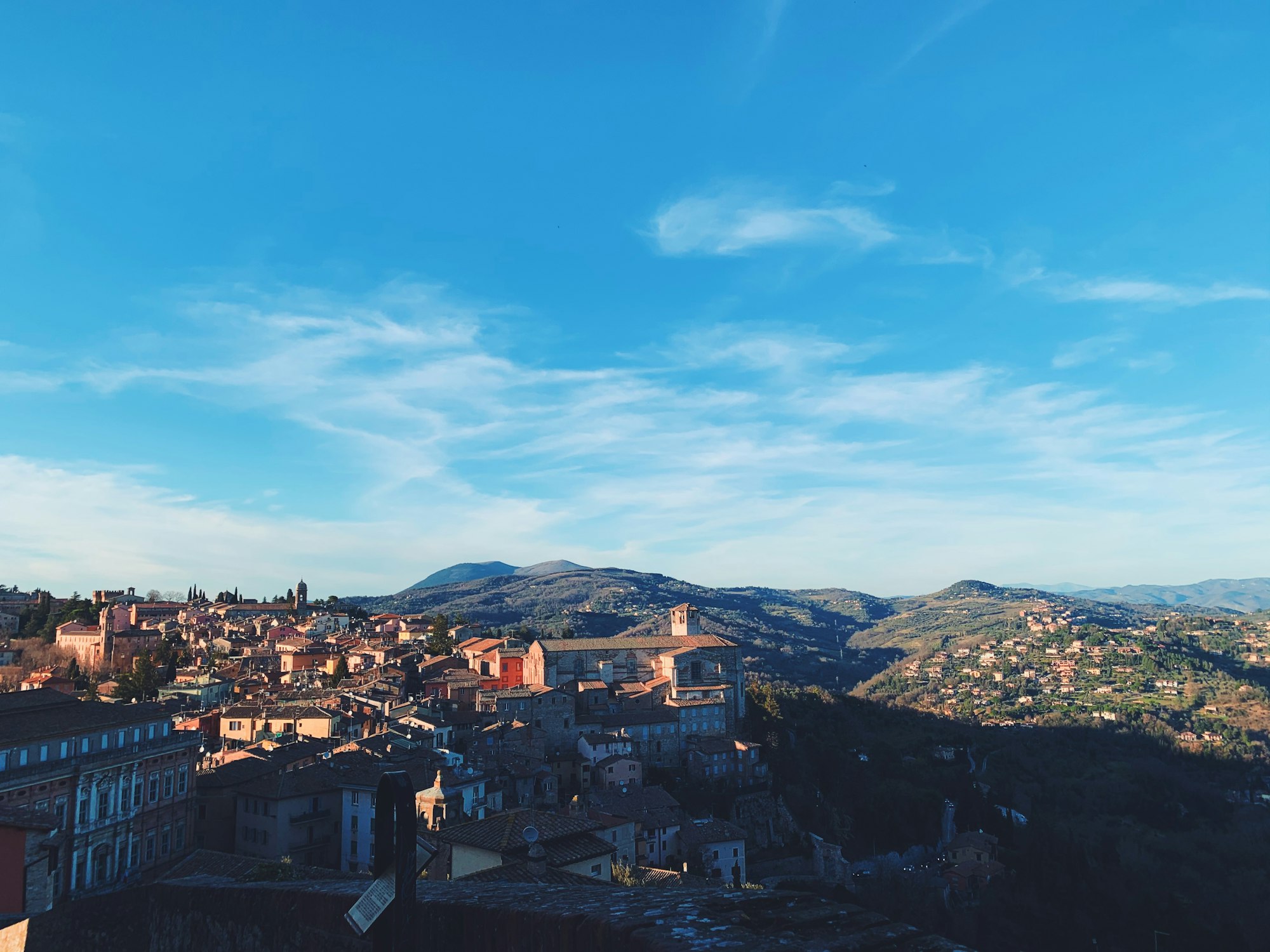 Perugia hilltop skyline under a blue sky