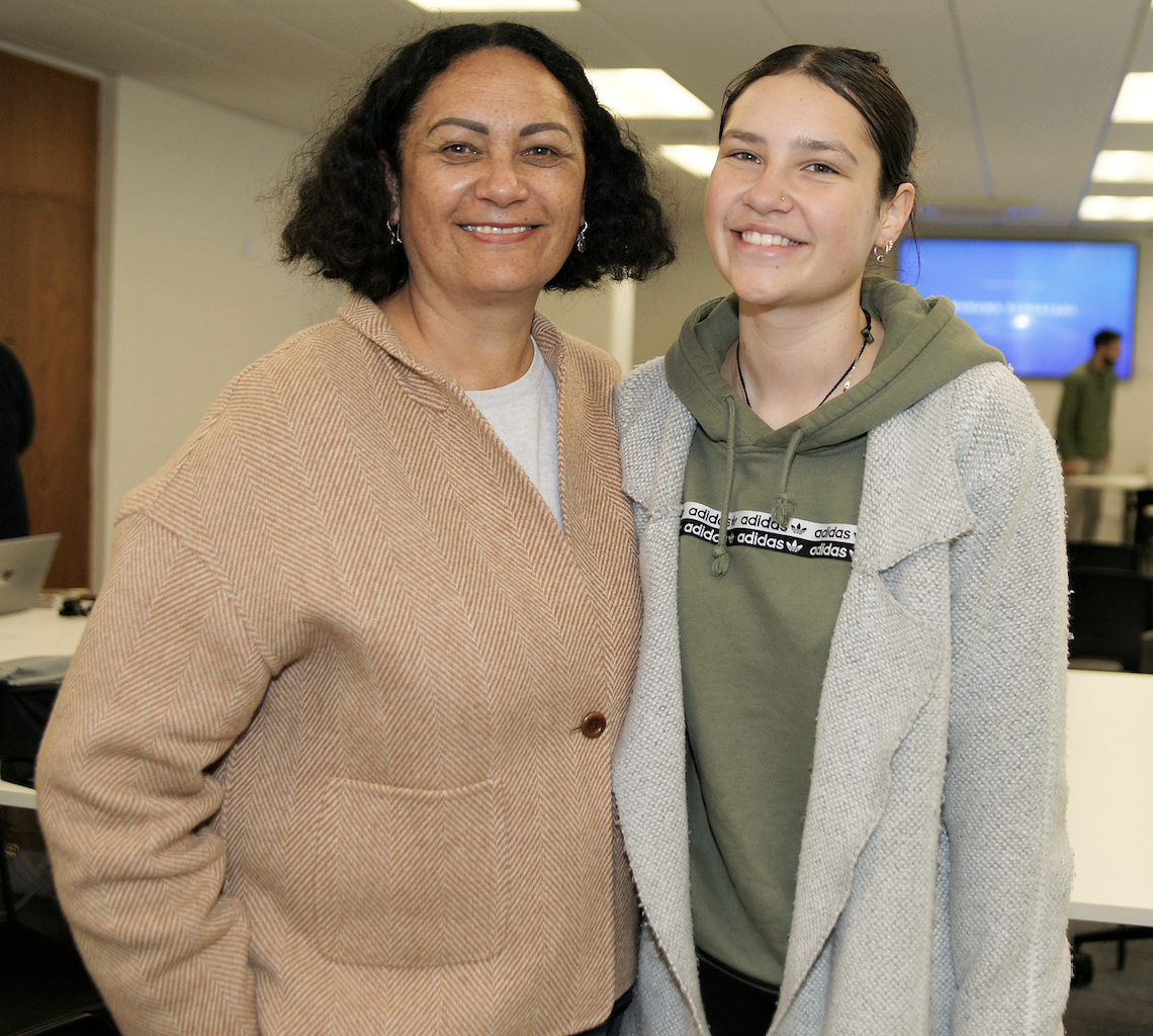 A Maori woman mentor with a young person