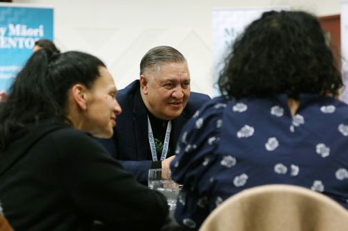 A team of people brainstorming Maori business