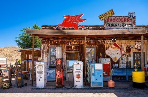 Vintage Hackberry General Store with Route 66 sign and old gas pumps