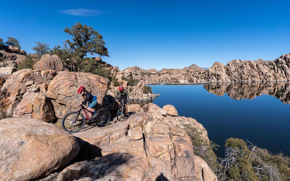 Patagonia Mountain Biking couple at sunrise