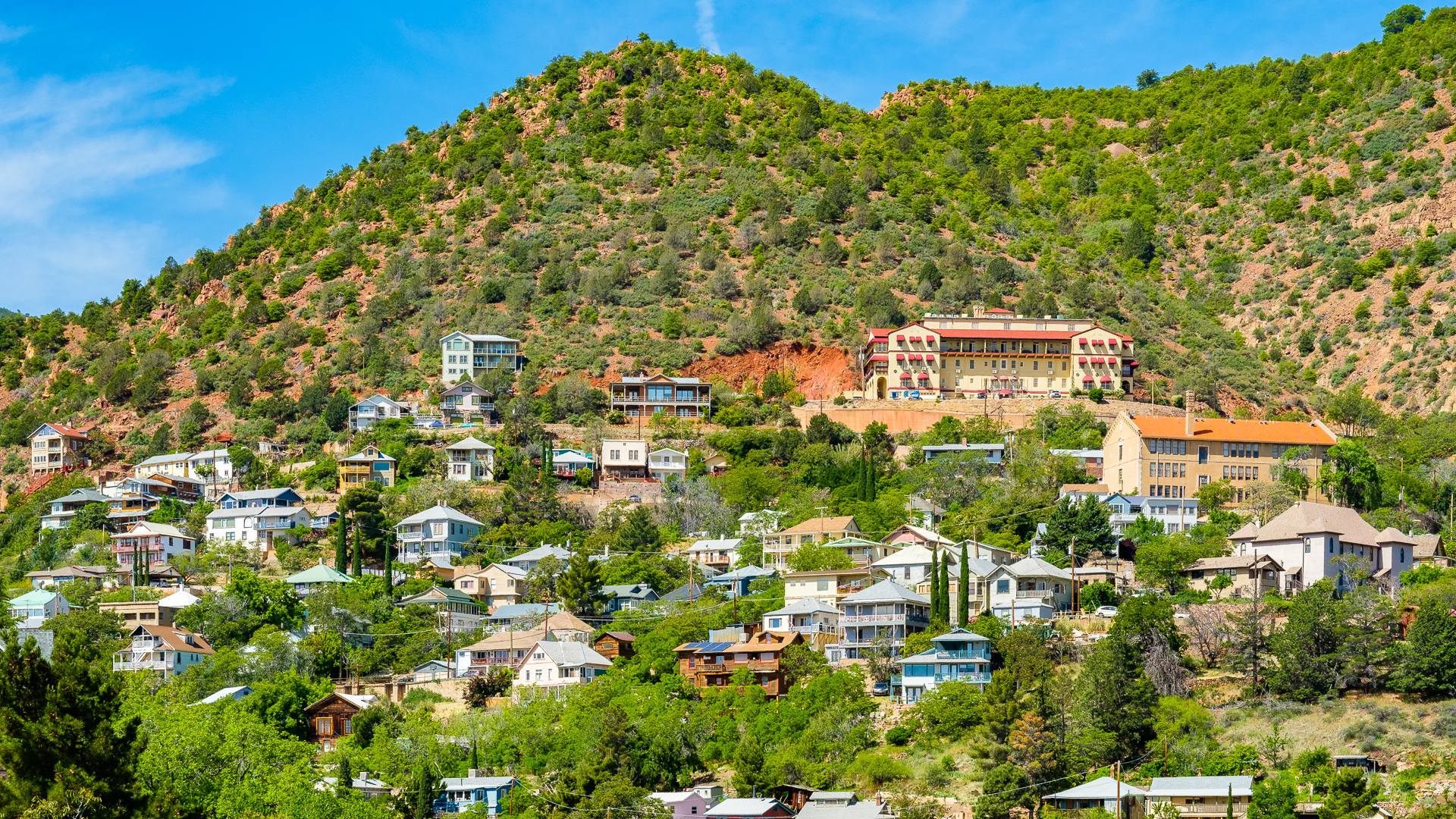 Historic buildings are nestled along the hillside in Jerome, Arizona.