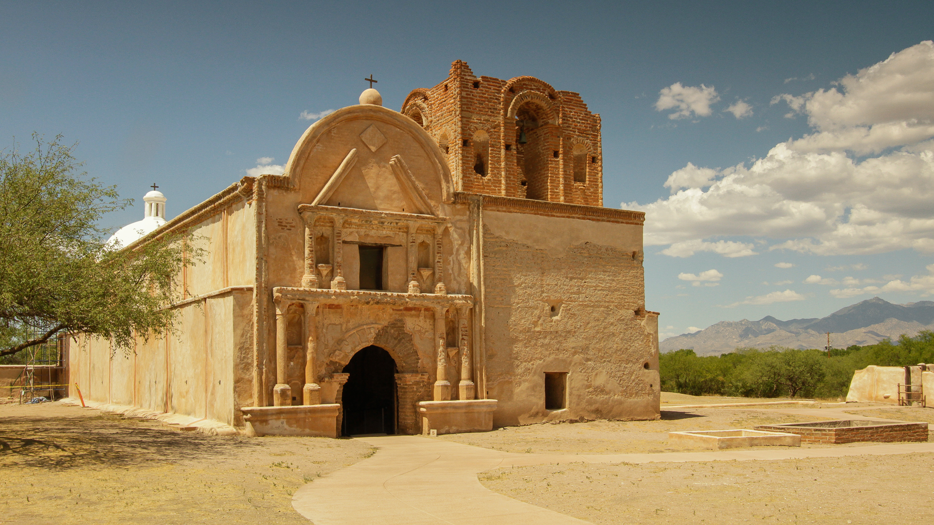 The 19th-century Spanish mission of Tumacácori against a blue sky. Credit: Arizona Office of Tourism.