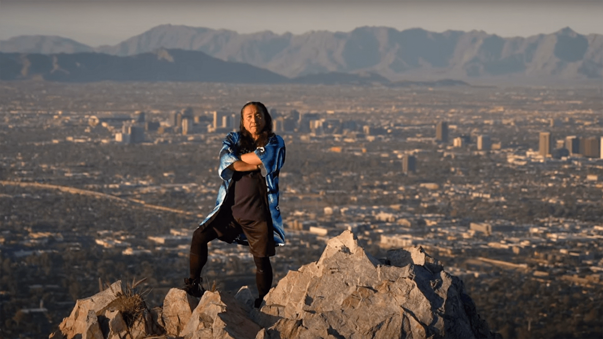 Arizona Revealed Ken Koshio standing on mountain
