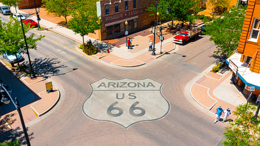 Aerial view of the historic Route 66 shield painted on the street near Standin' on the Corner Park in downtown Winslow, Arizona.