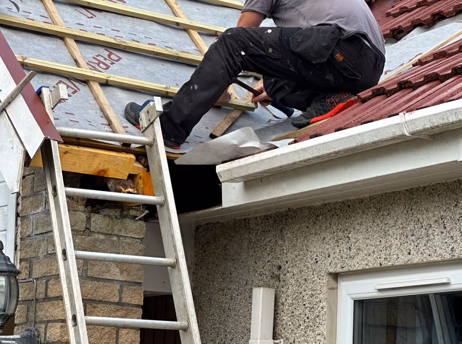 image of roof being repaired