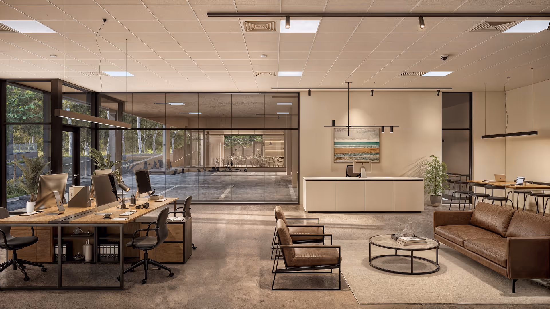 Office area with desks, chairs and a couch